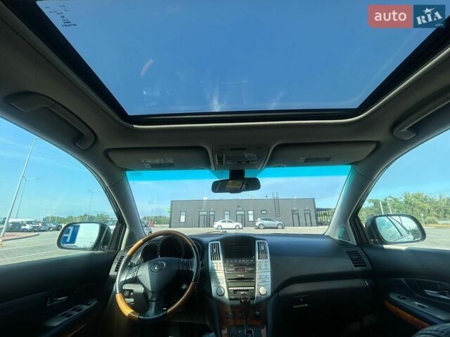 Черный Лексус РХ, объемом двигателя 3.46 л и пробегом 230 тыс. км за 14100 $, фото 64 на Automoto.ua
