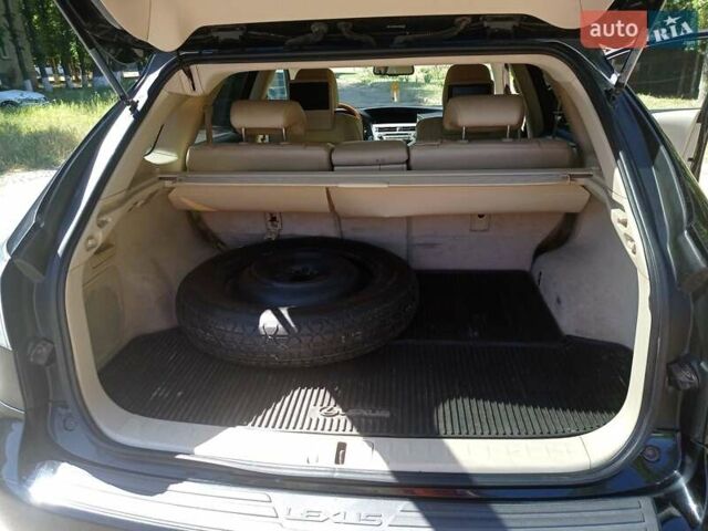 Черный Лексус РХ, объемом двигателя 3.46 л и пробегом 155 тыс. км за 15900 $, фото 3 на Automoto.ua