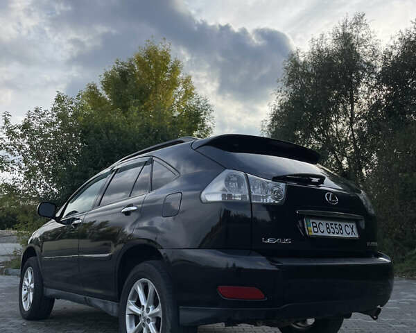 Черный Лексус РХ, объемом двигателя 3.46 л и пробегом 260 тыс. км за 11500 $, фото 2 на Automoto.ua