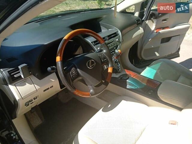 Черный Лексус РХ, объемом двигателя 3.46 л и пробегом 155 тыс. км за 15900 $, фото 1 на Automoto.ua