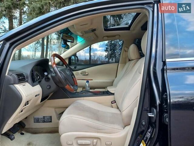 Черный Лексус РХ, объемом двигателя 3.46 л и пробегом 125 тыс. км за 21700 $, фото 1 на Automoto.ua