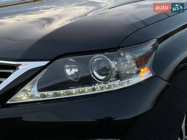 Черный Лексус РХ, объемом двигателя 3.5 л и пробегом 175 тыс. км за 19700 $, фото 1 на Automoto.ua
