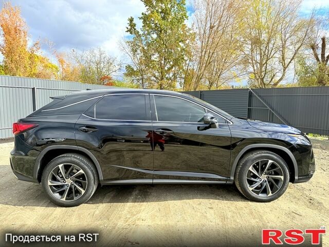 Черный Лексус РХ, объемом двигателя 3.5 л и пробегом 195 тыс. км за 25900 $, фото 1 на Automoto.ua