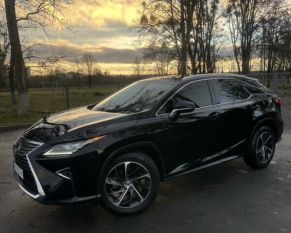 Черный Лексус РХ, объемом двигателя 3.46 л и пробегом 202 тыс. км за 28000 $, фото 2 на Automoto.ua