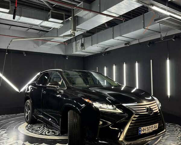 Черный Лексус РХ, объемом двигателя 3.5 л и пробегом 130 тыс. км за 30900 $, фото 1 на Automoto.ua