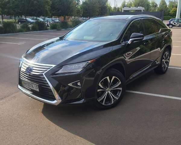 Черный Лексус РХ, объемом двигателя 3.46 л и пробегом 122 тыс. км за 35000 $, фото 1 на Automoto.ua