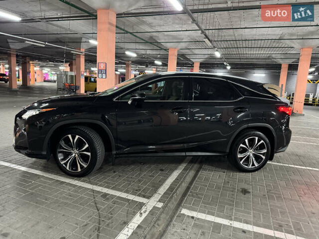 Чорний Лексус РХ, об'ємом двигуна 2 л та пробігом 111 тис. км за 31700 $, фото 2 на Automoto.ua