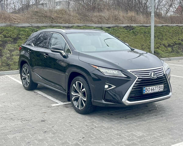 Черный Лексус РХ, объемом двигателя 2 л и пробегом 189 тыс. км за 28900 $, фото 1 на Automoto.ua