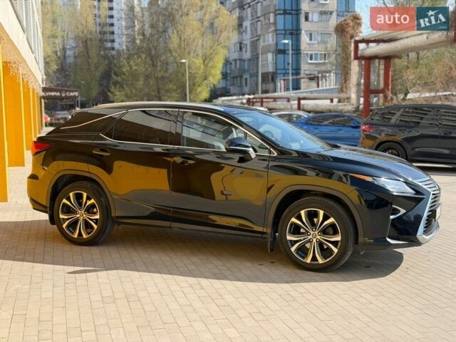 Черный Лексус РХ, объемом двигателя 2 л и пробегом 132 тыс. км за 32500 $, фото 4 на Automoto.ua
