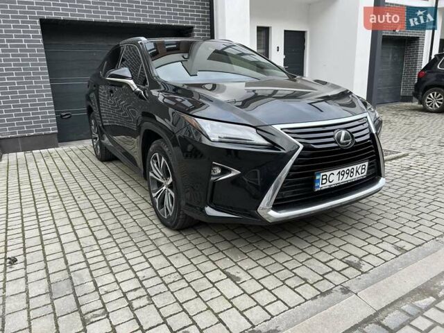 Черный Лексус РХ, объемом двигателя 3.46 л и пробегом 125 тыс. км за 34000 $, фото 1 на Automoto.ua