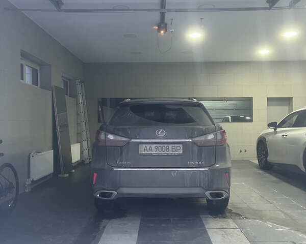 Черный Лексус РХ, объемом двигателя 2 л и пробегом 100 тыс. км за 39900 $, фото 1 на Automoto.ua