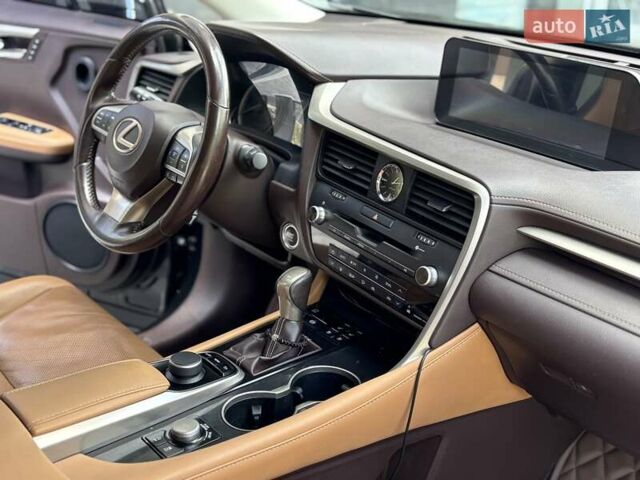 Черный Лексус РХ, объемом двигателя 2 л и пробегом 100 тыс. км за 40700 $, фото 1 на Automoto.ua