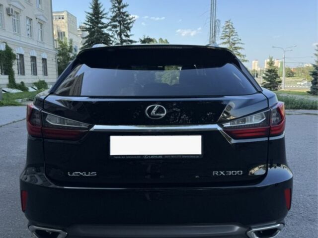 Чорний Лексус РХ, об'ємом двигуна 2 л та пробігом 110 тис. км за 37422 $, фото 1 на Automoto.ua