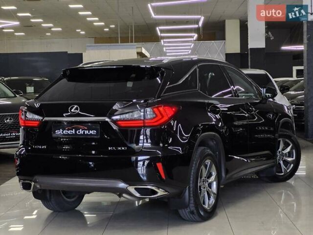 Чорний Лексус РХ, об'ємом двигуна 2 л та пробігом 70 тис. км за 34999 $, фото 1 на Automoto.ua