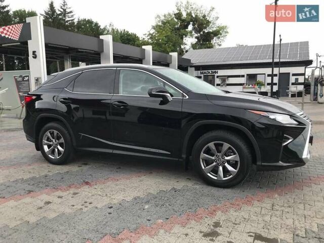 Чорний Лексус РХ, об'ємом двигуна 2 л та пробігом 102 тис. км за 35000 $, фото 2 на Automoto.ua