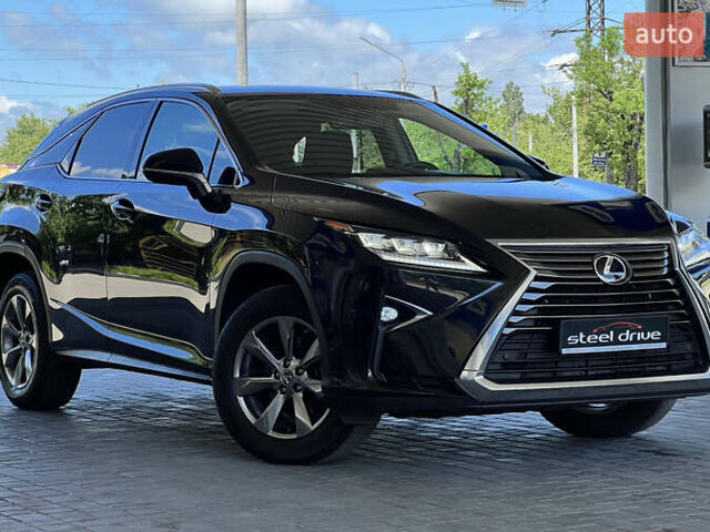 Черный Лексус РХ, объемом двигателя 2 л и пробегом 76 тыс. км за 32999 $, фото 2 на Automoto.ua