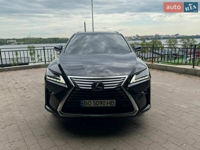 Черный Лексус РХ, объемом двигателя 3.46 л и пробегом 127 тыс. км за 35900 $, фото 1 на Automoto.ua