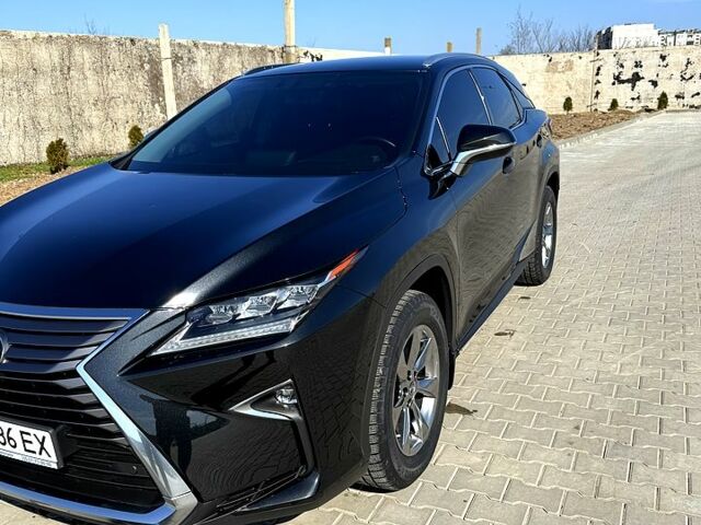 Черный Лексус РХ, объемом двигателя 2 л и пробегом 85 тыс. км за 32900 $, фото 2 на Automoto.ua