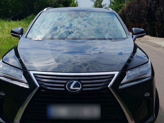 Чорний Лексус РХ, об'ємом двигуна 2 л та пробігом 215 тис. км за 26500 $, фото 1 на Automoto.ua