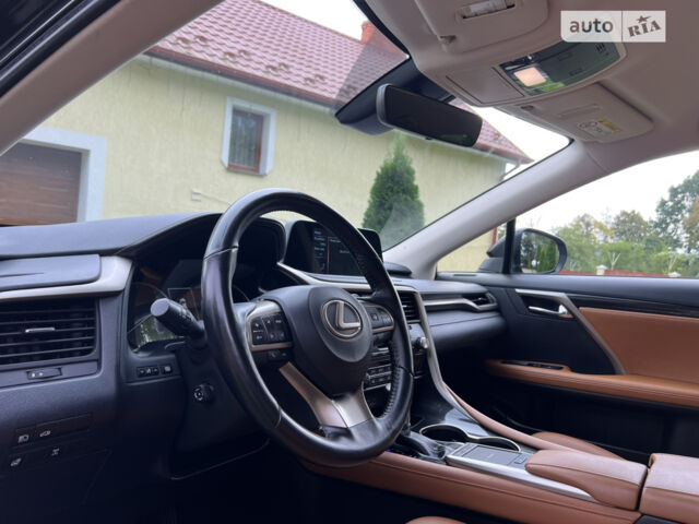Черный Лексус РХ, объемом двигателя 2 л и пробегом 157 тыс. км за 41750 $, фото 55 на Automoto.ua