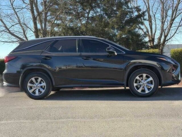 Черный Лексус РХ, объемом двигателя 3.5 л и пробегом 42 тыс. км за 6900 $, фото 1 на Automoto.ua