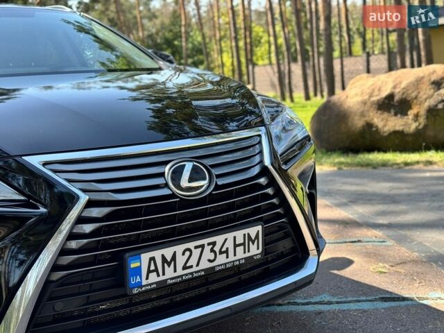 Чорний Лексус РХ, об'ємом двигуна 2 л та пробігом 119 тис. км за 39000 $, фото 2 на Automoto.ua