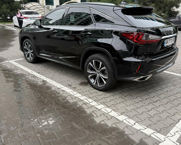 Черный Лексус РХ, объемом двигателя 3.5 л и пробегом 100 тыс. км за 35500 $, фото 1 на Automoto.ua