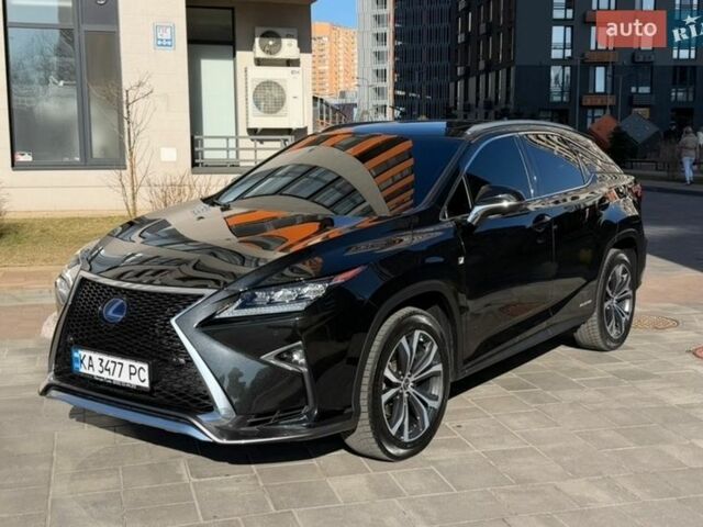 Черный Лексус РХ, объемом двигателя 3.5 л и пробегом 140 тыс. км за 47800 $, фото 1 на Automoto.ua