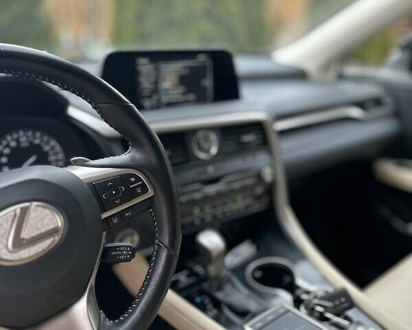 Черный Лексус РХ, объемом двигателя 2 л и пробегом 68 тыс. км за 47000 $, фото 1 на Automoto.ua