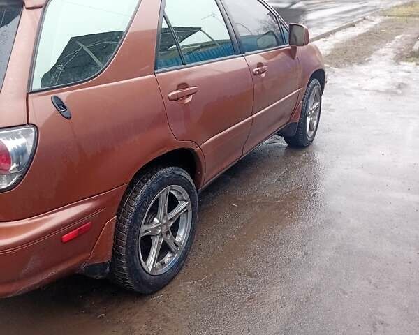 Коричневий Лексус РХ, об'ємом двигуна 3 л та пробігом 480 тис. км за 6000 $, фото 6 на Automoto.ua