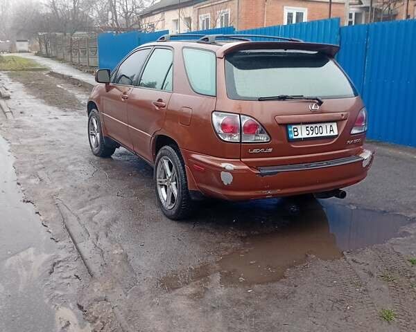 Коричневий Лексус РХ, об'ємом двигуна 3 л та пробігом 480 тис. км за 6000 $, фото 5 на Automoto.ua