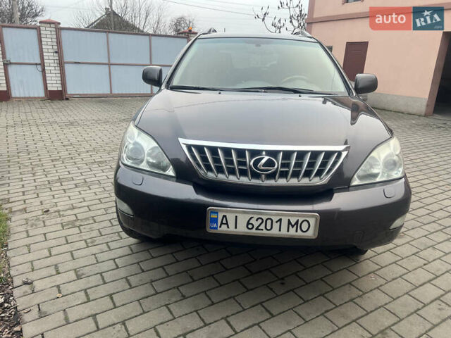 Коричневый Лексус РХ, объемом двигателя 3.46 л и пробегом 194 тыс. км за 10800 $, фото 1 на Automoto.ua