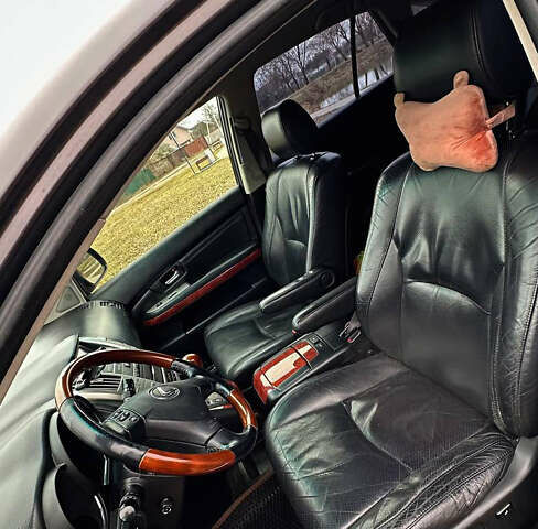 Коричневый Лексус РХ, объемом двигателя 3.46 л и пробегом 324 тыс. км за 12100 $, фото 1 на Automoto.ua