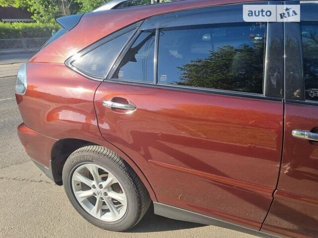 Коричневый Лексус РХ, объемом двигателя 3.5 л и пробегом 180 тыс. км за 12000 $, фото 1 на Automoto.ua