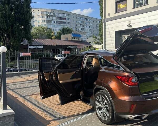 Коричневий Лексус РХ, об'ємом двигуна 2 л та пробігом 129 тис. км за 35500 $, фото 30 на Automoto.ua