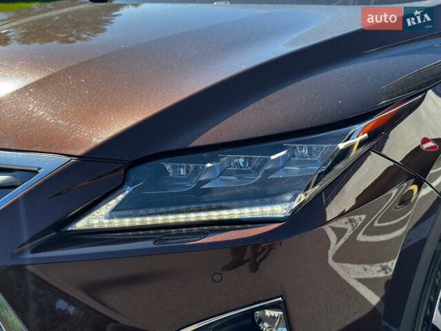 Коричневий Лексус РХ, об'ємом двигуна 2 л та пробігом 170 тис. км за 26900 $, фото 19 на Automoto.ua