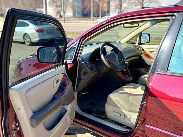 Красный Лексус РХ, объемом двигателя 3 л и пробегом 229 тыс. км за 5299 $, фото 4 на Automoto.ua