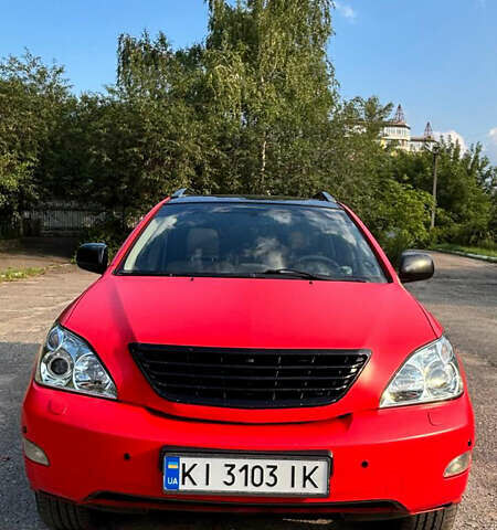 Красный Лексус РХ, объемом двигателя 3.5 л и пробегом 290 тыс. км за 10377 $, фото 2 на Automoto.ua