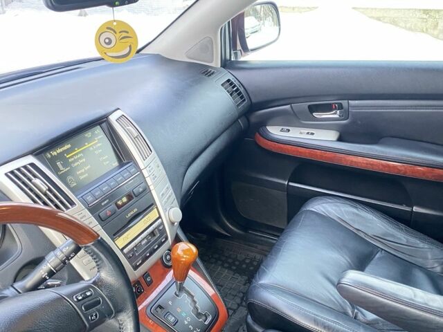 Красный Лексус РХ, объемом двигателя 3.5 л и пробегом 218 тыс. км за 9500 $, фото 2 на Automoto.ua