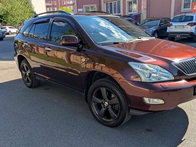 Красный Лексус РХ, объемом двигателя 3.5 л и пробегом 251 тыс. км за 11100 $, фото 1 на Automoto.ua