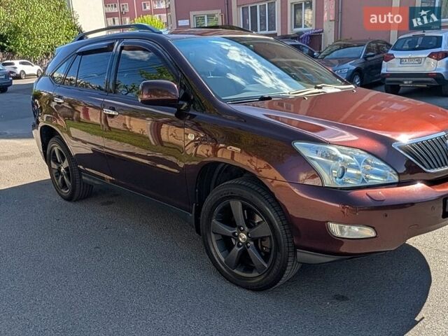 Красный Лексус РХ, объемом двигателя 3.5 л и пробегом 251 тыс. км за 13000 $, фото 2 на Automoto.ua