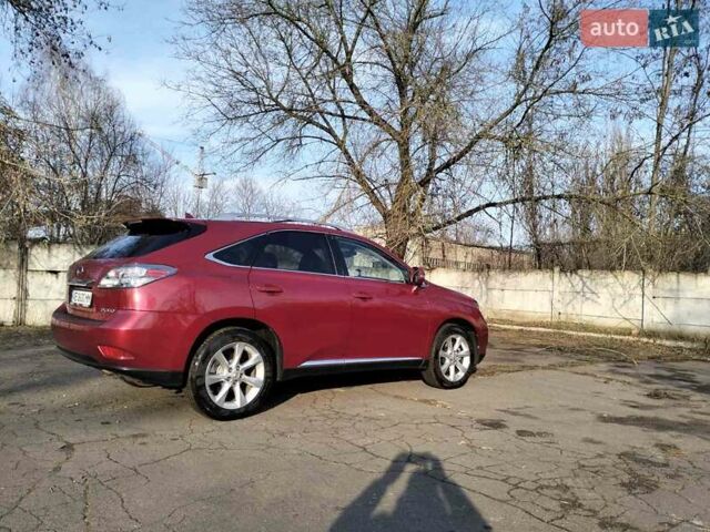 Красный Лексус РХ, объемом двигателя 3.46 л и пробегом 265 тыс. км за 17700 $, фото 1 на Automoto.ua