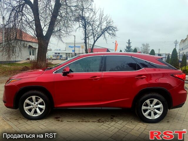 Красный Лексус РХ, объемом двигателя 3.5 л и пробегом 23800 тыс. км за 24999 $, фото 1 на Automoto.ua