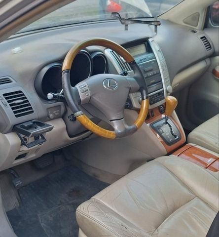 Жовтий Лексус РХ, об'ємом двигуна 3.31 л та пробігом 560 тис. км за 4999 $, фото 3 на Automoto.ua