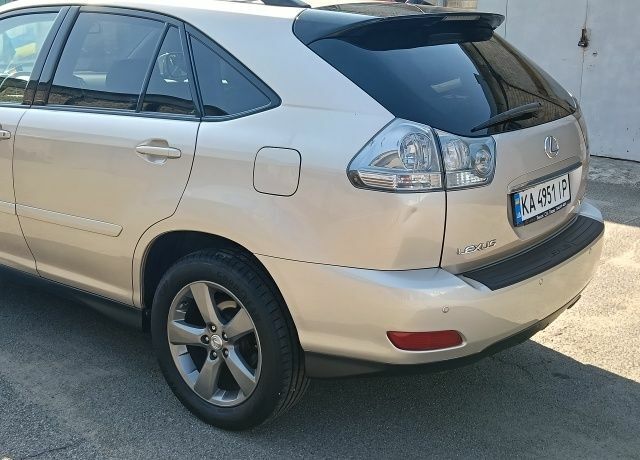 Желтый Лексус РХ, объемом двигателя 3.5 л и пробегом 170 тыс. км за 13539 $, фото 4 на Automoto.ua