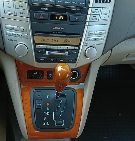 Желтый Лексус РХ, объемом двигателя 3.5 л и пробегом 170 тыс. км за 13539 $, фото 19 на Automoto.ua