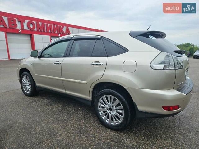 Желтый Лексус РХ, объемом двигателя 3.31 л и пробегом 222 тыс. км за 12500 $, фото 1 на Automoto.ua