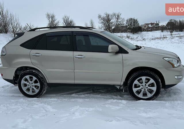 Желтый Лексус РХ, объемом двигателя 3.46 л и пробегом 160 тыс. км за 11300 $, фото 3 на Automoto.ua