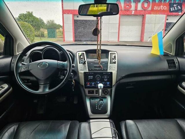 Желтый Лексус РХ, объемом двигателя 3.31 л и пробегом 222 тыс. км за 12500 $, фото 14 на Automoto.ua