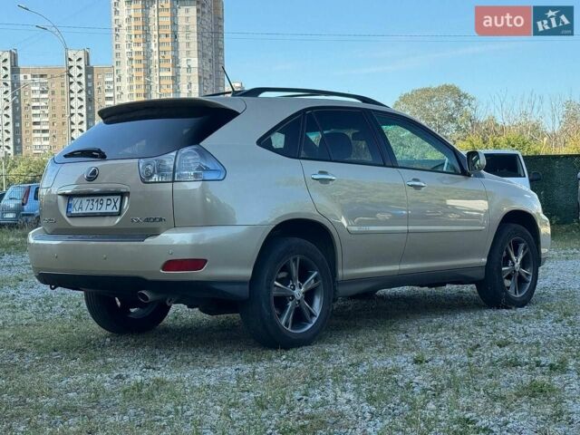 Желтый Лексус РХ, объемом двигателя 3.3 л и пробегом 224 тыс. км за 11800 $, фото 4 на Automoto.ua